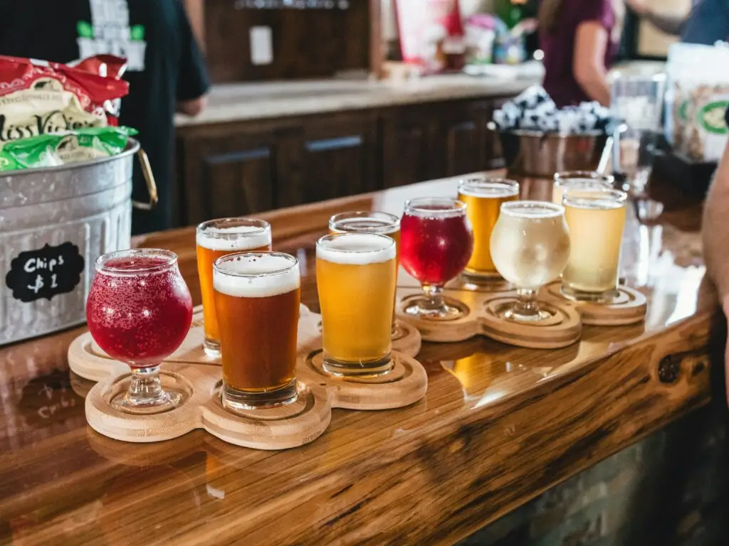 Side view of a selection of glasses with different types of cider