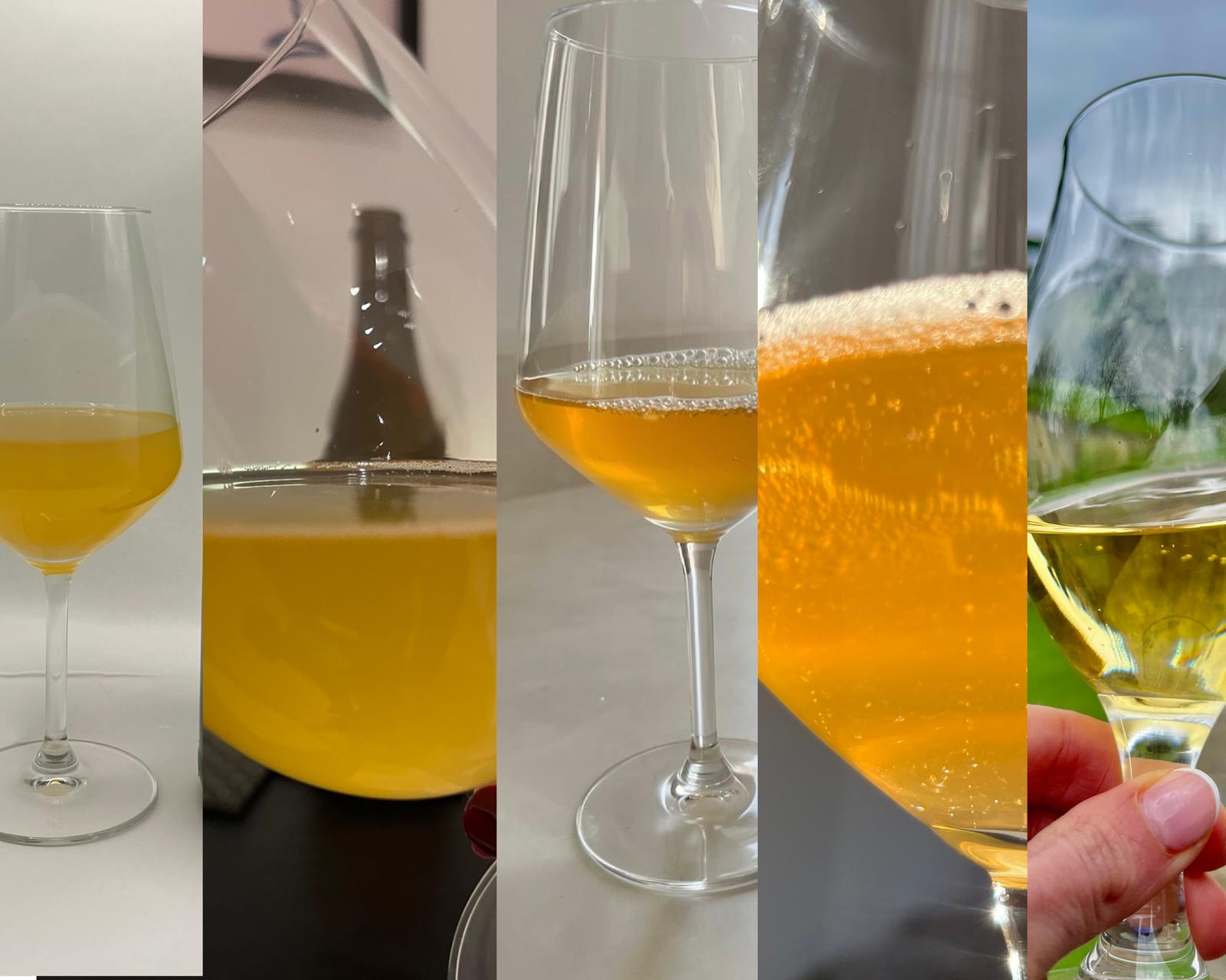 View of many wine glasses with cider inside looking very wine alike